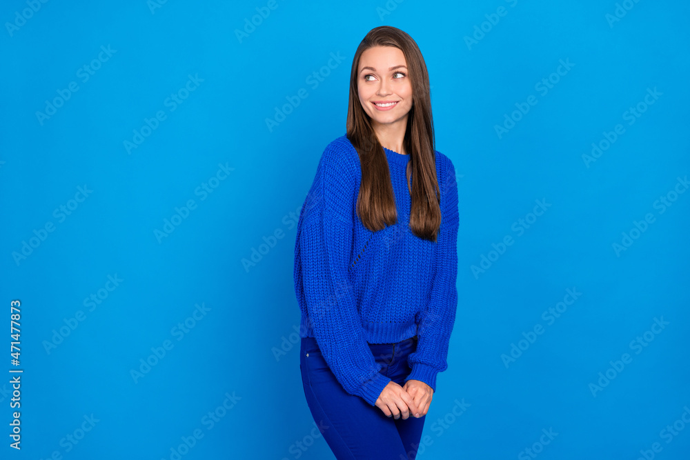 Fototapeta premium Portrait of attractive curious cheerful girl posing deciding copy empty space isolated on bright blue color background