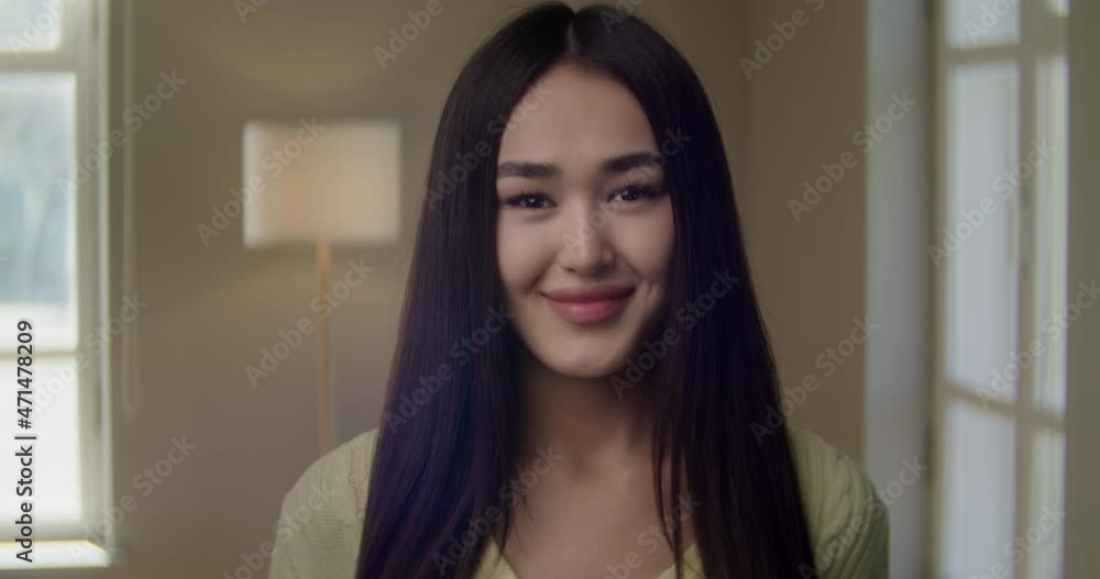Beautiful Attractive Young Asian Woman Looking at Camera With Happy Emotion Enjoying Successful Lifestyle, Close Up Front Portrait. Slow Motion Close Up View Portrait Beautiful Attractive Young Asian Woman Looking at Camera With Happy Emotion Enjoying Successful Lifestyle, Close Up Front Portrait. Slow Motion Close Up View Portrait