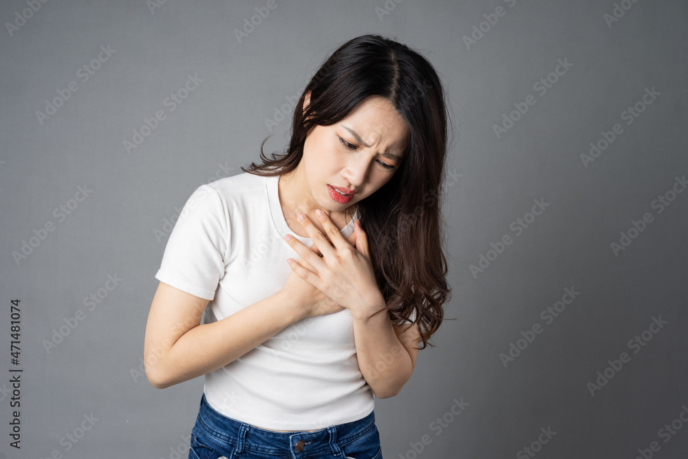 Asian girl portrait, isolated on gray background Asian girl portrait, isolated on gray background