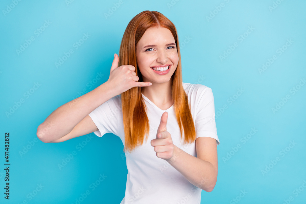Fototapeta premium Photo of cheerful person hand show call me indicate finger you camera isolated on blue color background