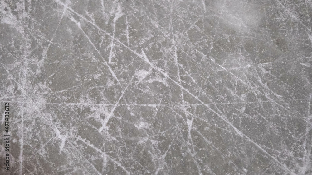 ice background with ice skating and hockey marks, gray texture. Stock Photo  | Adobe Stock