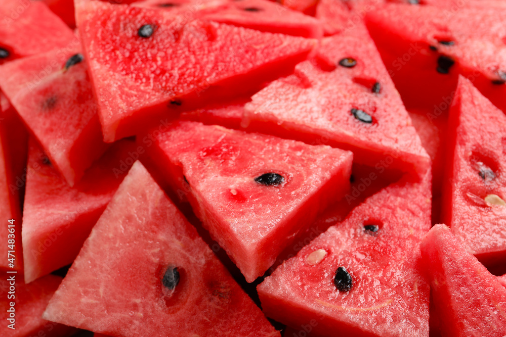 Delicious fresh watermelon slices as background, closeup Delicious fresh watermelon slices as background, closeup