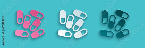 Paper cut Medicine pill or tablet icon isolated on blue background. Capsule pill and drug sign. Pharmacy design. Paper art style. Vector