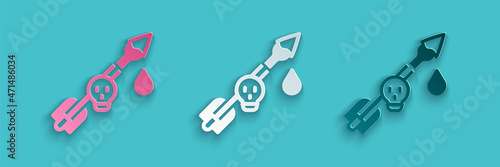 Paper cut Poison on the arrow icon isolated on blue background. Poisoned arrow. Paper art style. Vector