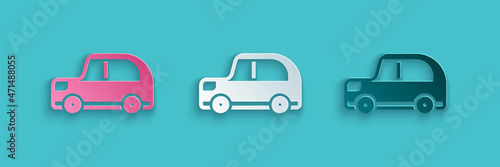 Paper cut Car icon isolated on blue background. Paper art style. Vector