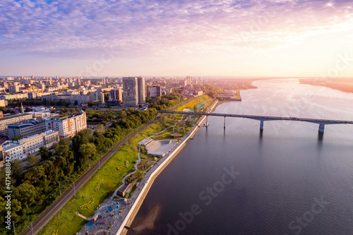 Aerial top view panorama city Perm and central embankment of Kama river Russia, sunset drone photo photo