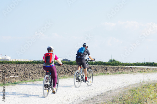 Cycling is a timeless passion that makes us stay in contact with nature. © Enrico Spetrino