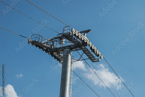 Cable car support wire rope on blue sky background.