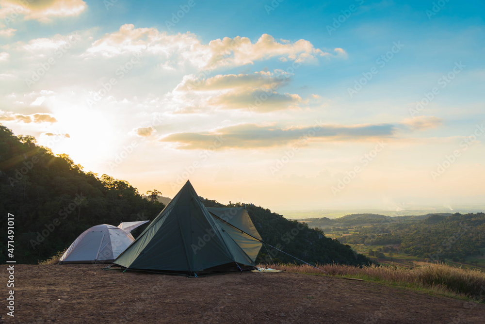 Camping tent with mountain background in holiday