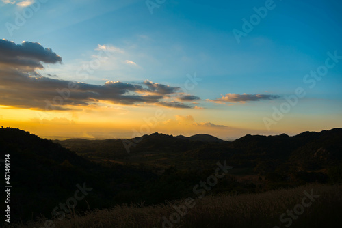 beautiful sunset with mountain silhouette view.rural scenery