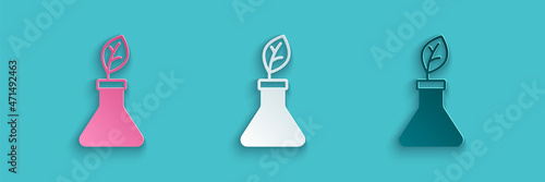 Paper cut Plant breeding icon isolated on blue background. Plants growing in the test tubes. Organic food ,agriculture and hydroponic. Paper art style. Vector