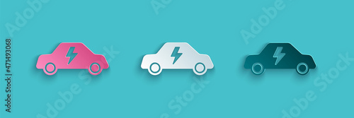 Paper cut Electric car and electrical cable plug charging icon isolated on blue background. Renewable eco technologies. Paper art style. Vector