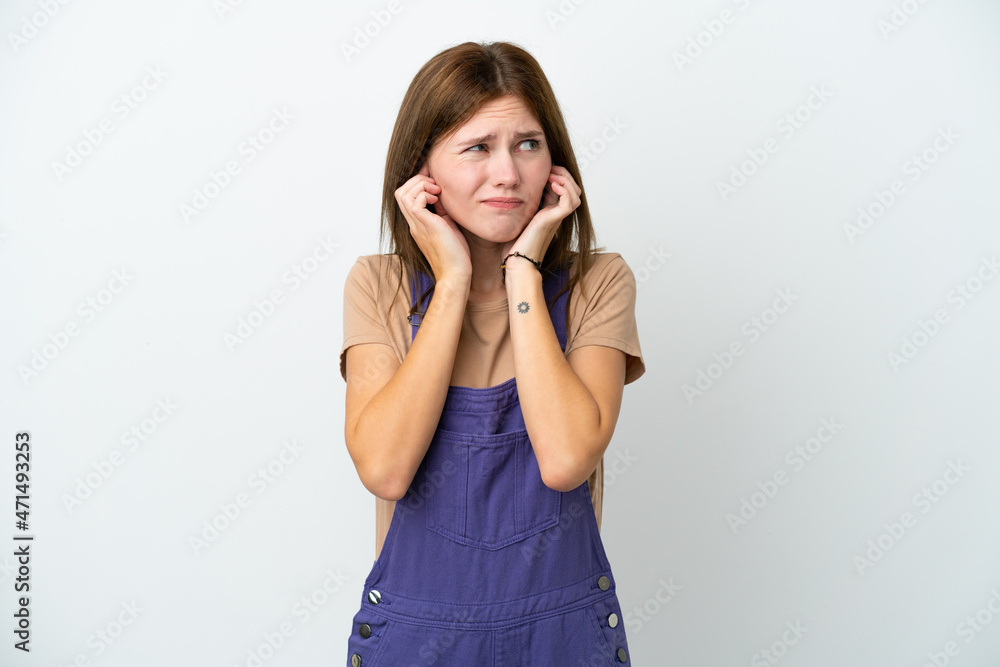 Young English woman isolated on white background frustrated and covering ears Young English woman isolated on white background frustrated and covering ears