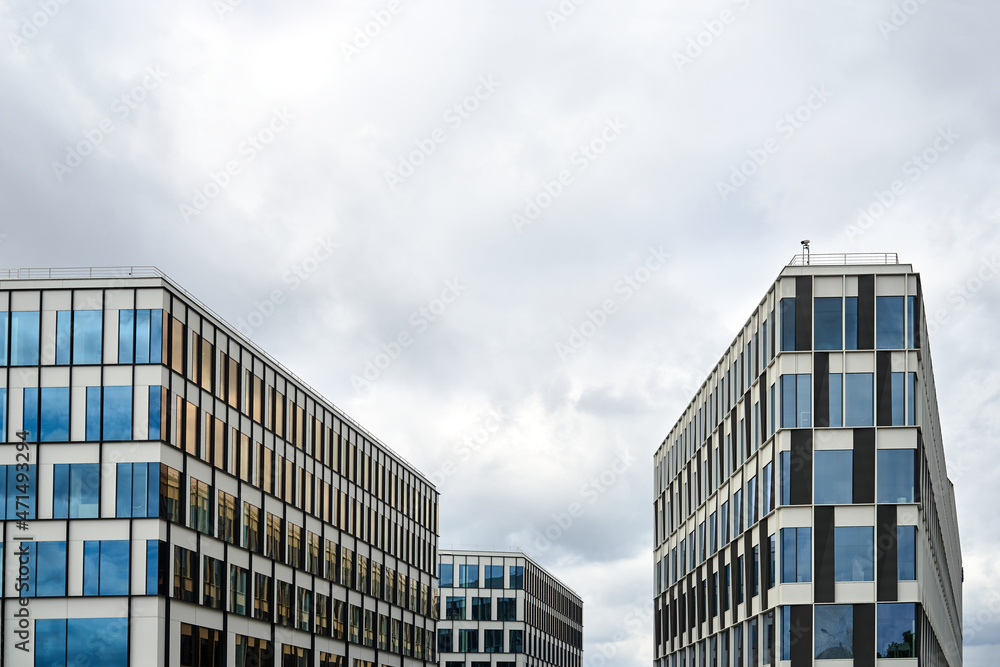 facades of modern, multi-storey office buildings facades of modern, multi-storey office buildings