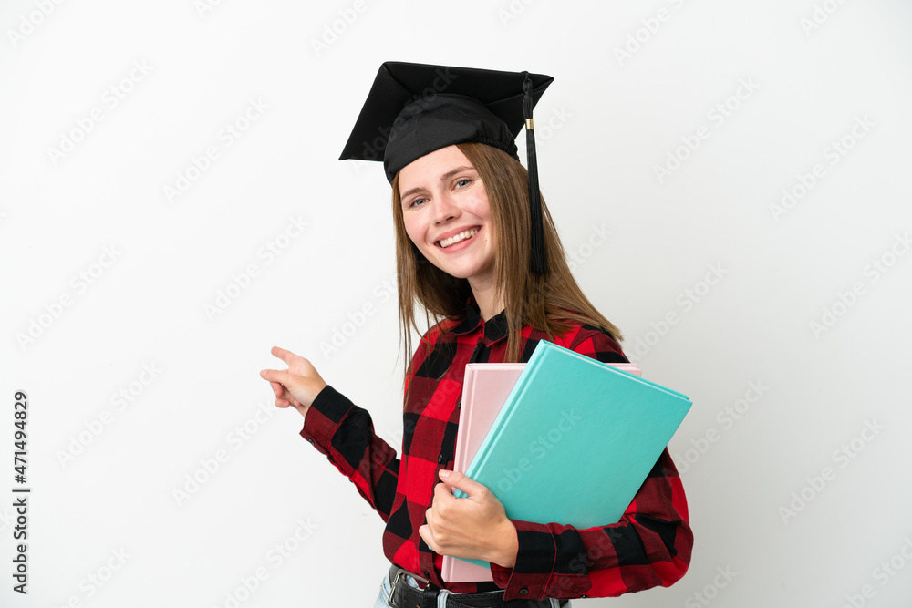 Young English student woman isolated on white background pointing back Young English student woman isolated on white background pointing back