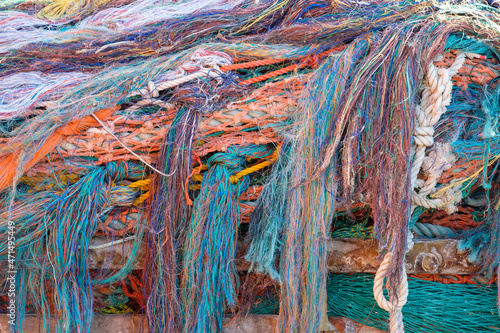 Fishing net on a fishing vessel deck. Close-up shot.