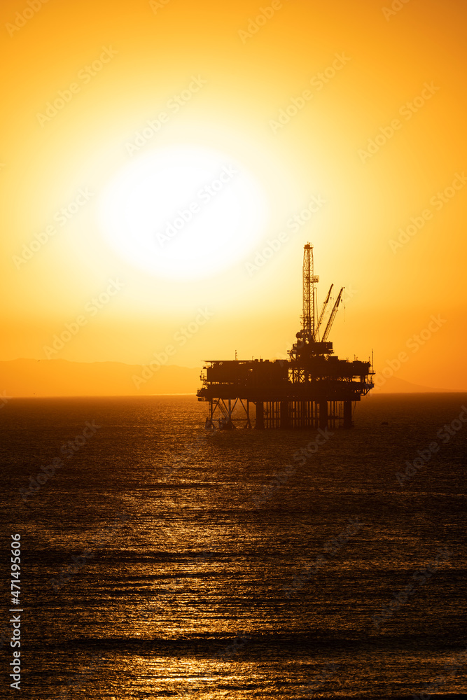 Offshore oil platform at dusk