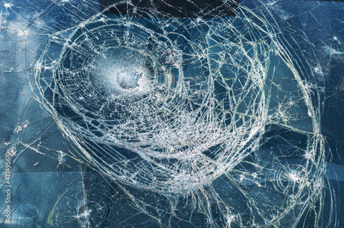 Car glass shattered by a stone photo