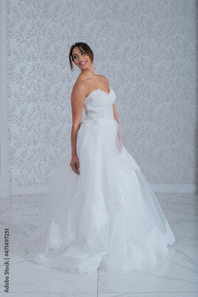 Girl with wedding dress posing for photo shoot