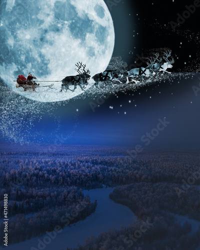 Fotografia Flight of Santa's deer in Christmas night