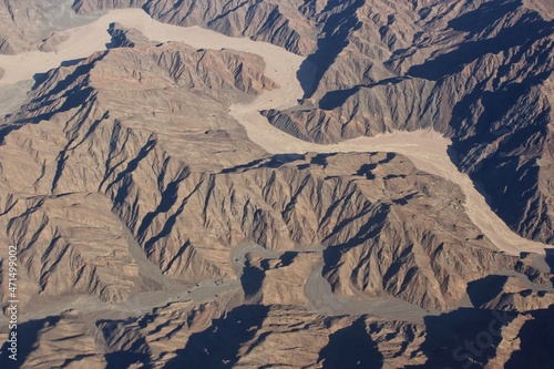 Top down view of the rocky desert in Egypt from the airplane window photo