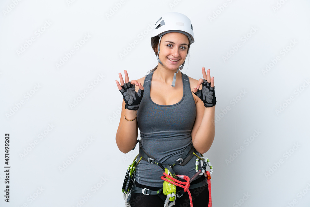 Young Ukrainian rock climber woman isolated on white background showing an ok sign with fingers Young Ukrainian rock climber woman isolated on white background showing an ok sign with fingers