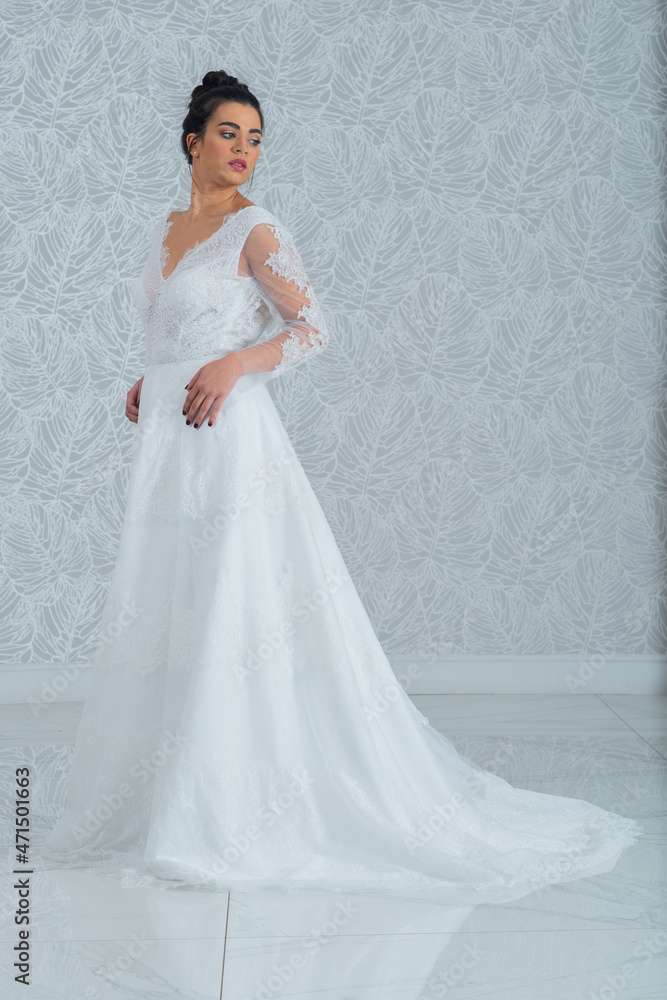 Girl with wedding dress posing for photo shoot Girl with wedding dress posing for photo shoot
