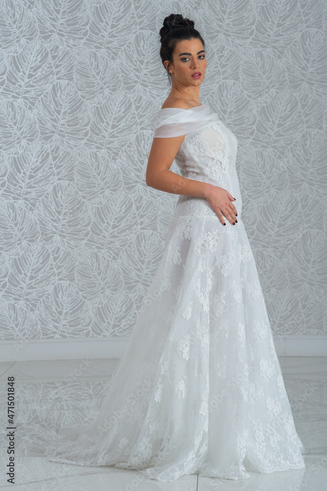 Girl with wedding dress posing for photo shoot Girl with wedding dress posing for photo shoot