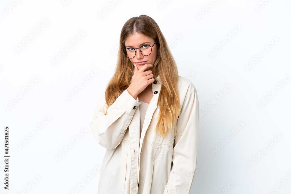 Young blonde woman isolated on white background thinking Young blonde woman isolated on white background thinking