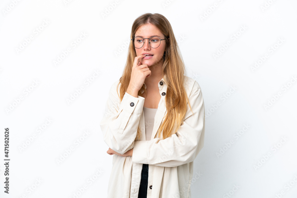 Young blonde woman isolated on white background nervous and scared Young blonde woman isolated on white background nervous and scared