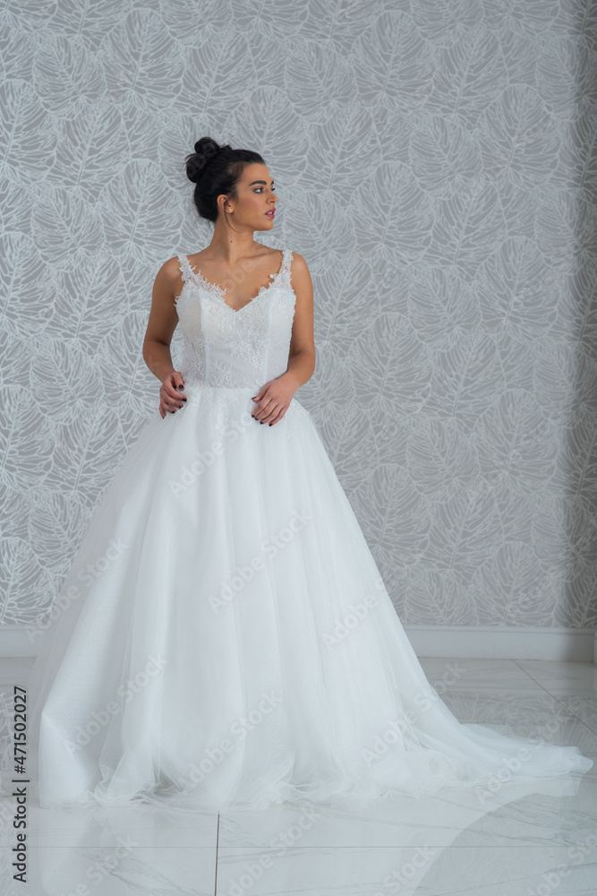 Girl with wedding dress posing for photo shoot