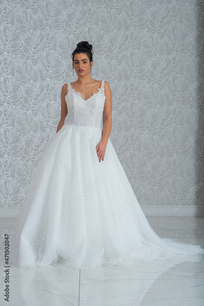 Girl with wedding dress posing for photo shoot Girl with wedding dress posing for photo shoot