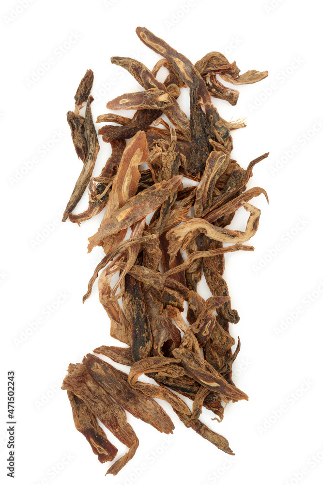 Obraz premium Stemona root herb used in traditional Chinese herbal medicine on white background. Used to lower blood pressure, treat lung infections and parasitic worm infections. Bai bu.