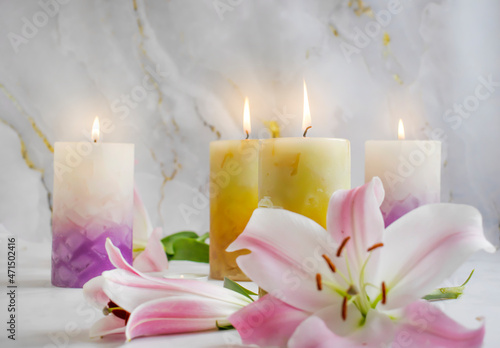 candle burning, flower lily background