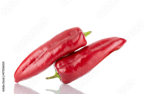 Two red sweet peppers, close-up, isolated on white.