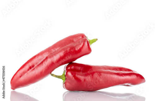 Two red sweet peppers, close-up, isolated on white.