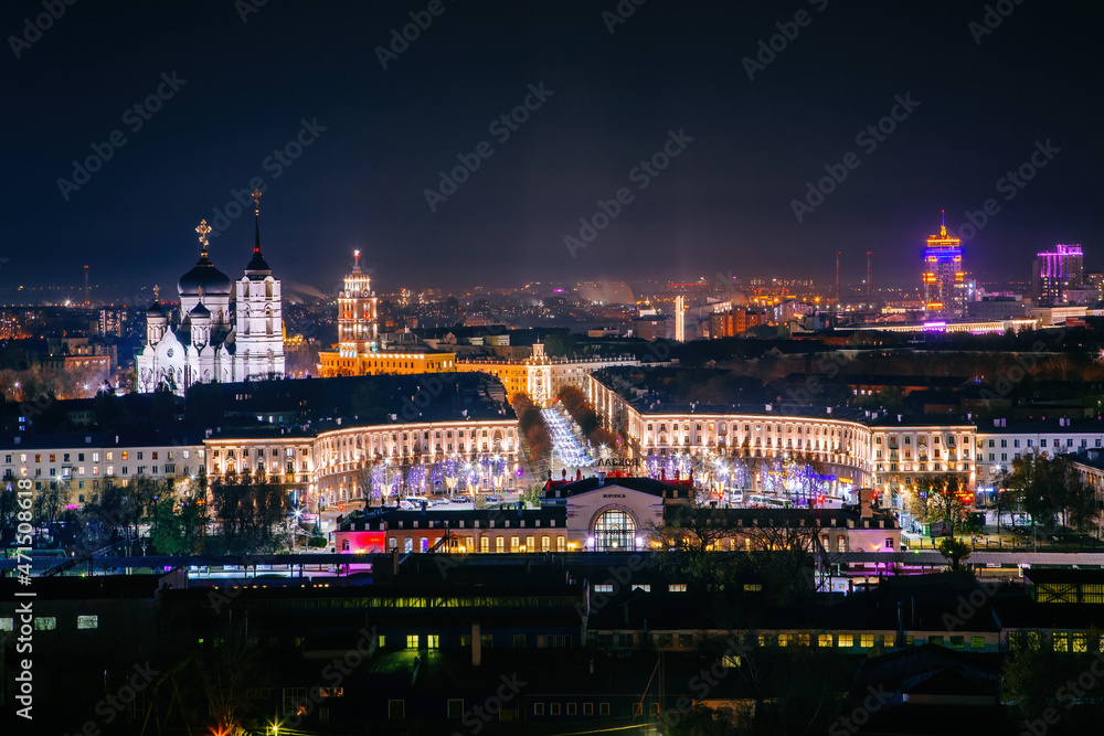 Night Voronezh downtown. View to Voronezh railway station, Mira Street, South-eastern railway main building and Annunciation Cathedral