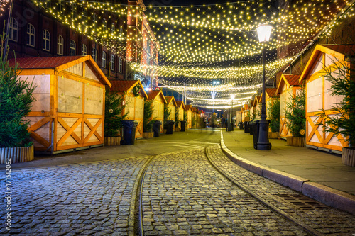 Beautiful Christmas fair in the old town of Gdansk at night, Poland