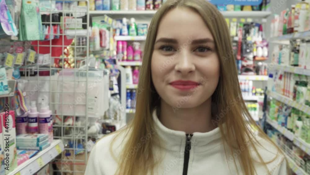 Portrait of a Caucasian woman walking down the sales floor Portrait of a Caucasian woman walking down the sales floor