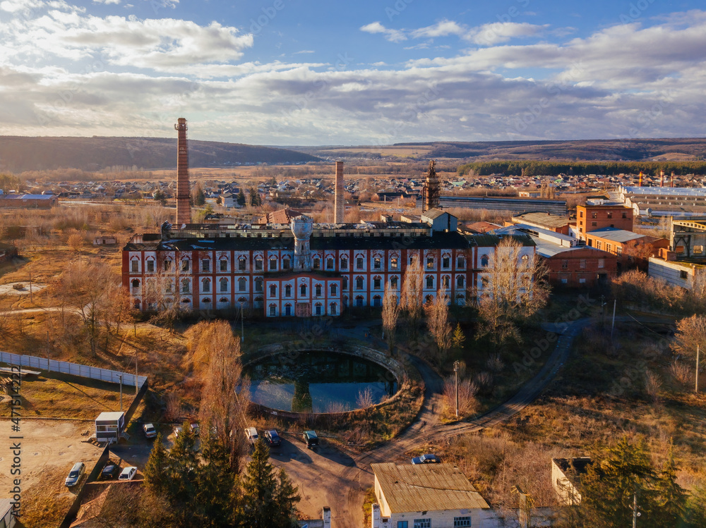 Old abandoned Novotavolzhansky sugar factory in Belgorod region, aerial view