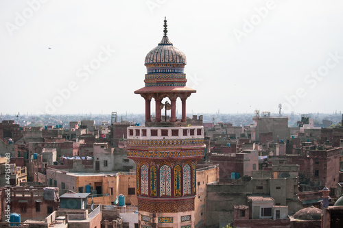 Minaret of the Wazir Khan Mosque (Masjid) in Lahore historical center, Punjab, Pakistan photo