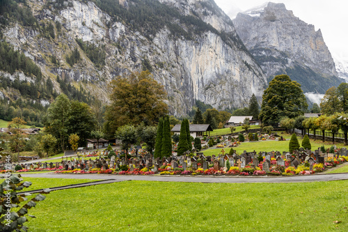 An old cemetery on the floor of the Lauterbrunnen Valley in the swiss alps Switzerland