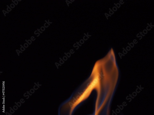The fire is burning. Flames on a black background.