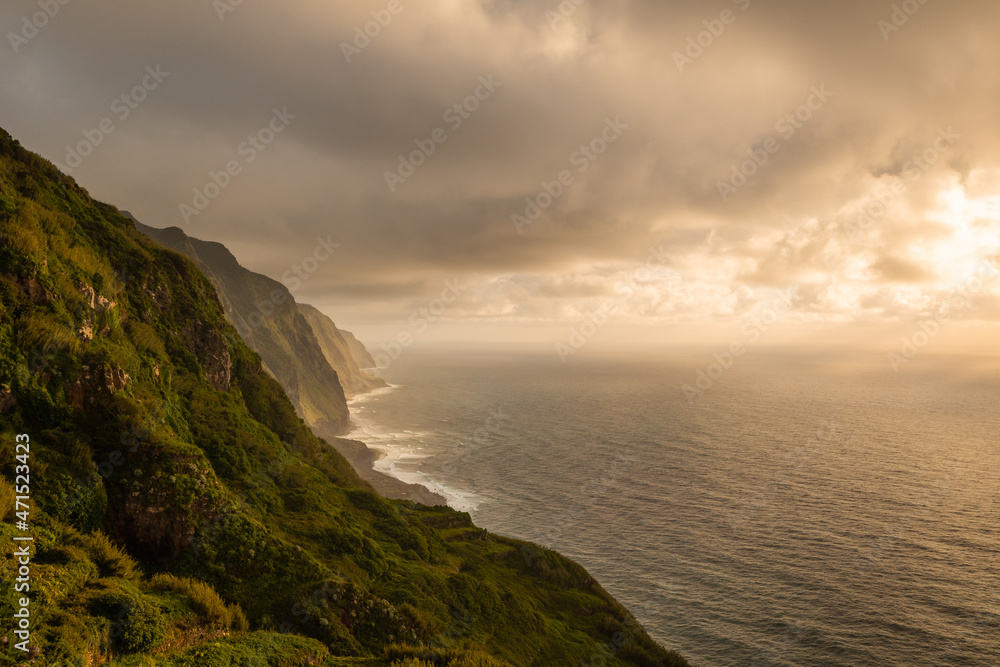 The green coast of Madeira over the Atlantic Ocean photographed in spring.