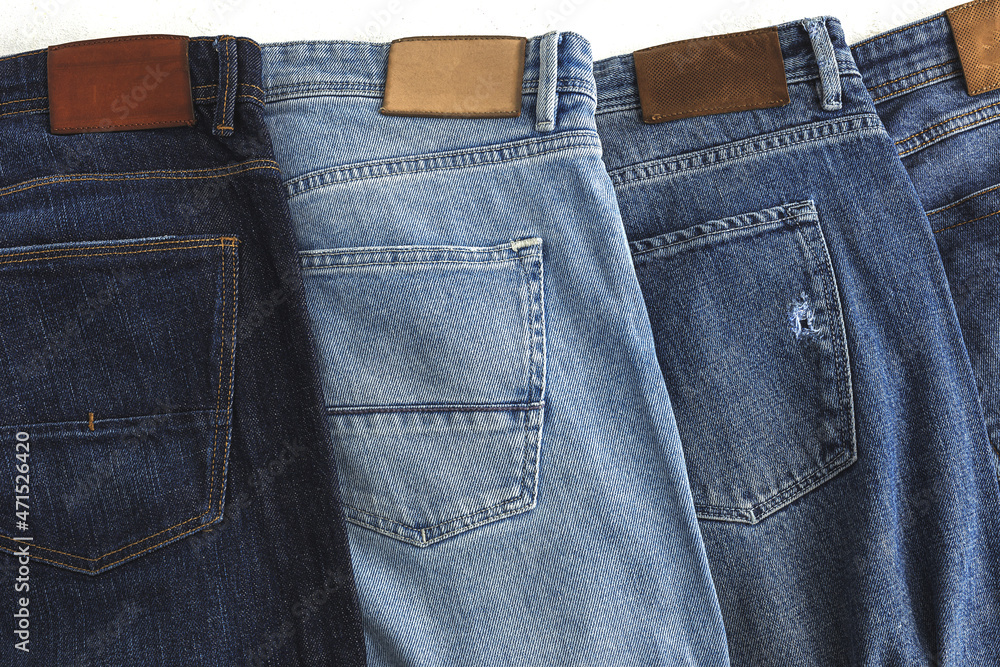 Heap of blue jeans in studio Heap of blue jeans in studio