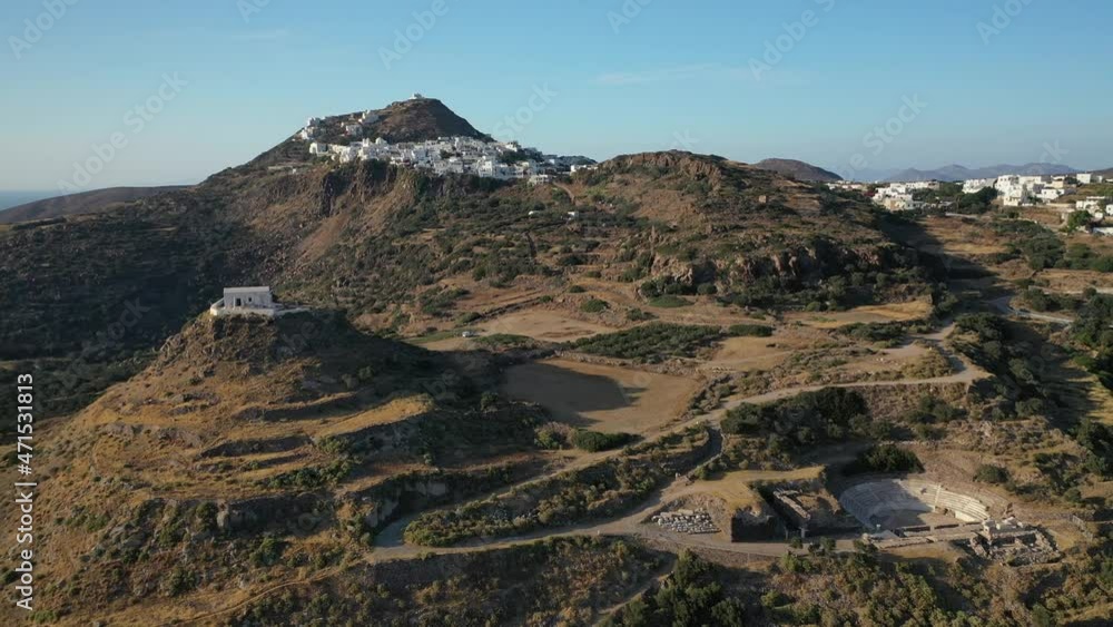 Aerial drone video of iconic ancient theatre of Milos island where statue Venus of Milo was discovered, Cyclades, Greece