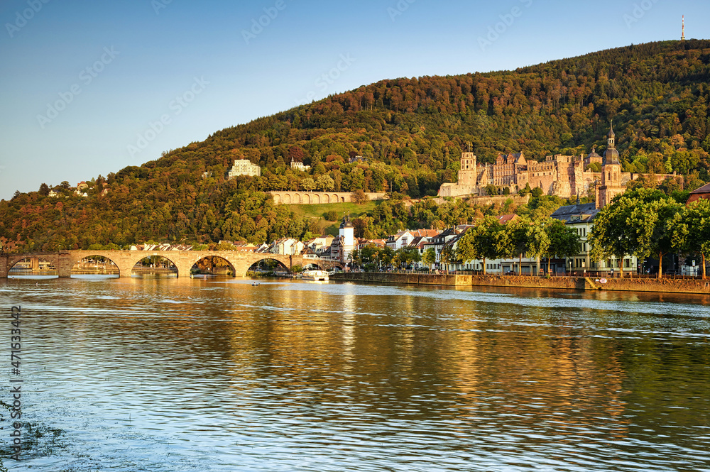 The historic city of Heidelberg with the castle, the Old Bridge, river Neckar and the Bridge Gate. Germany.