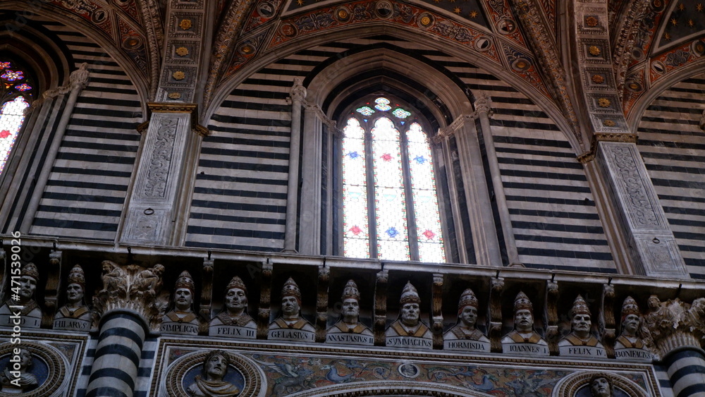 Main altar from the interior of the Siena Dome (Duomo) with without visitors during the day 