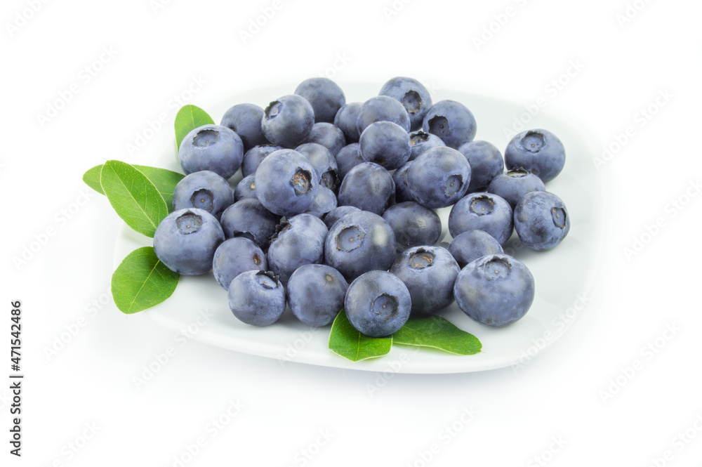 Blueberries in a plate on white background Blueberries in a plate on white background