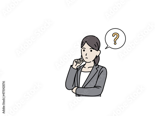 考え込む　考える　会社員　ビジネスウーマン　スーツ姿の女性　思考　疑問　腕を組む　？